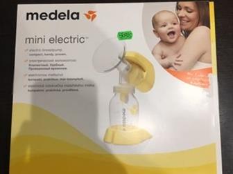    Medela mini ,   ,    ,   ,       ,   