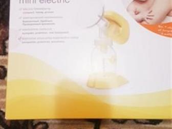  Medela Mini Electric     ,      ,        